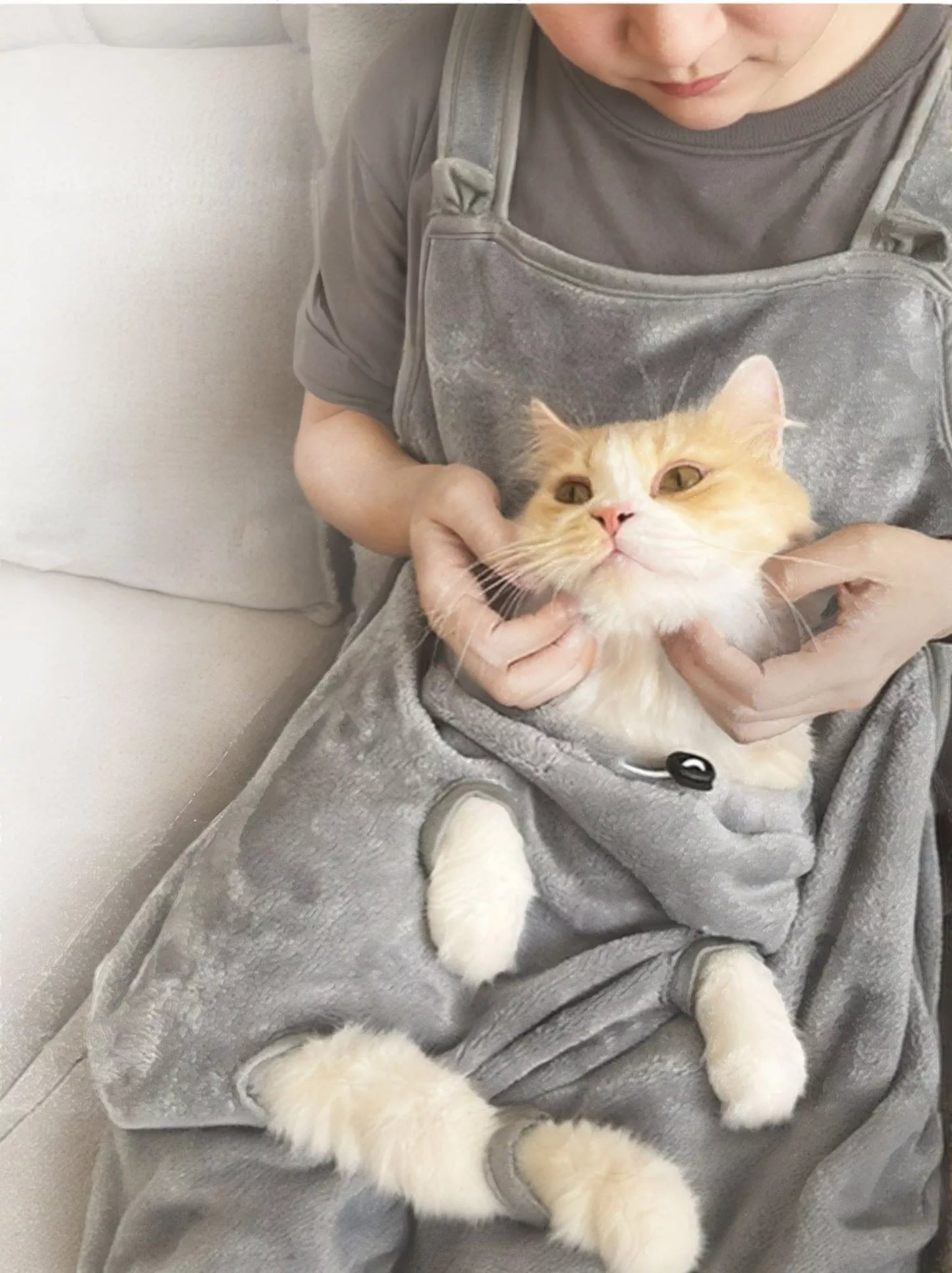 Cozy hands-free pet carrier apron with paw holes for dogs and cats