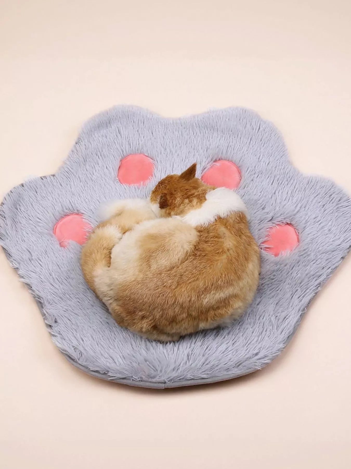 Cute paw-shaped plush pet mat for dogs and cats
