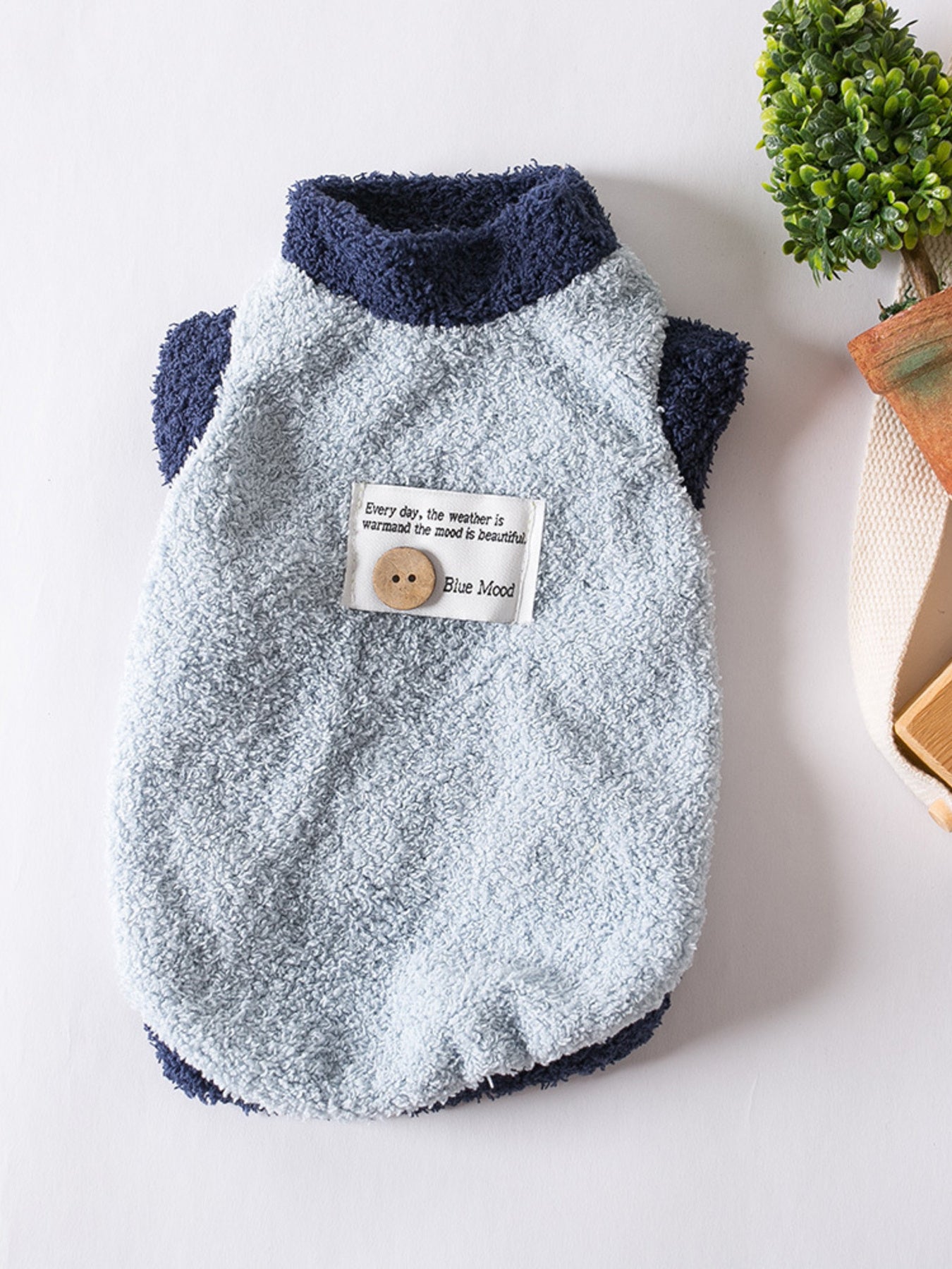 Fleece pet sweater with button detail, cozy winter knitwear for dogs and cats