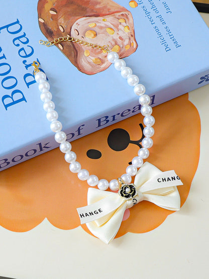 Pearl Bow-Knot Pet Necklace – Elegant Jewelry Accessory for Dogs & Cats – view 9